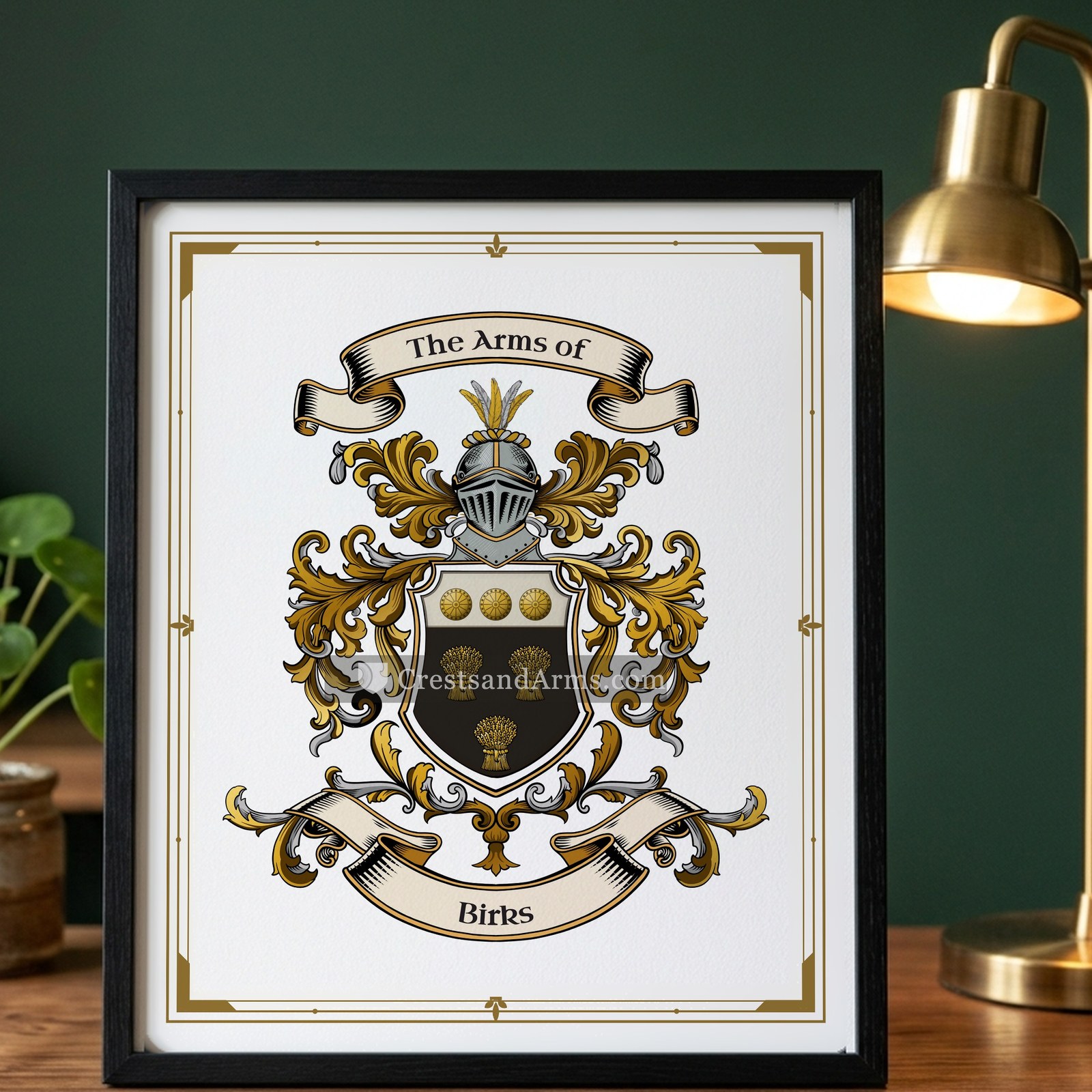 The Birks arms on the framed, black wood