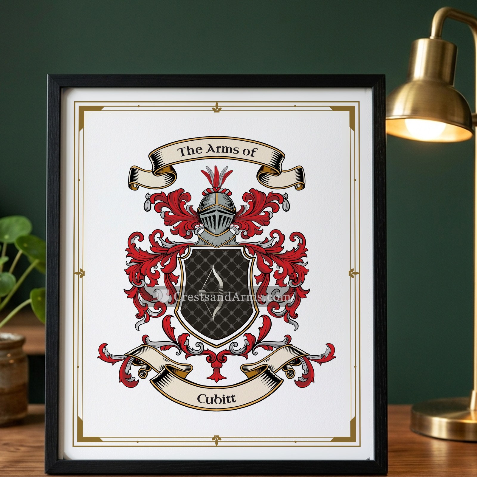 The Cubitt arms on the framed, black wood
